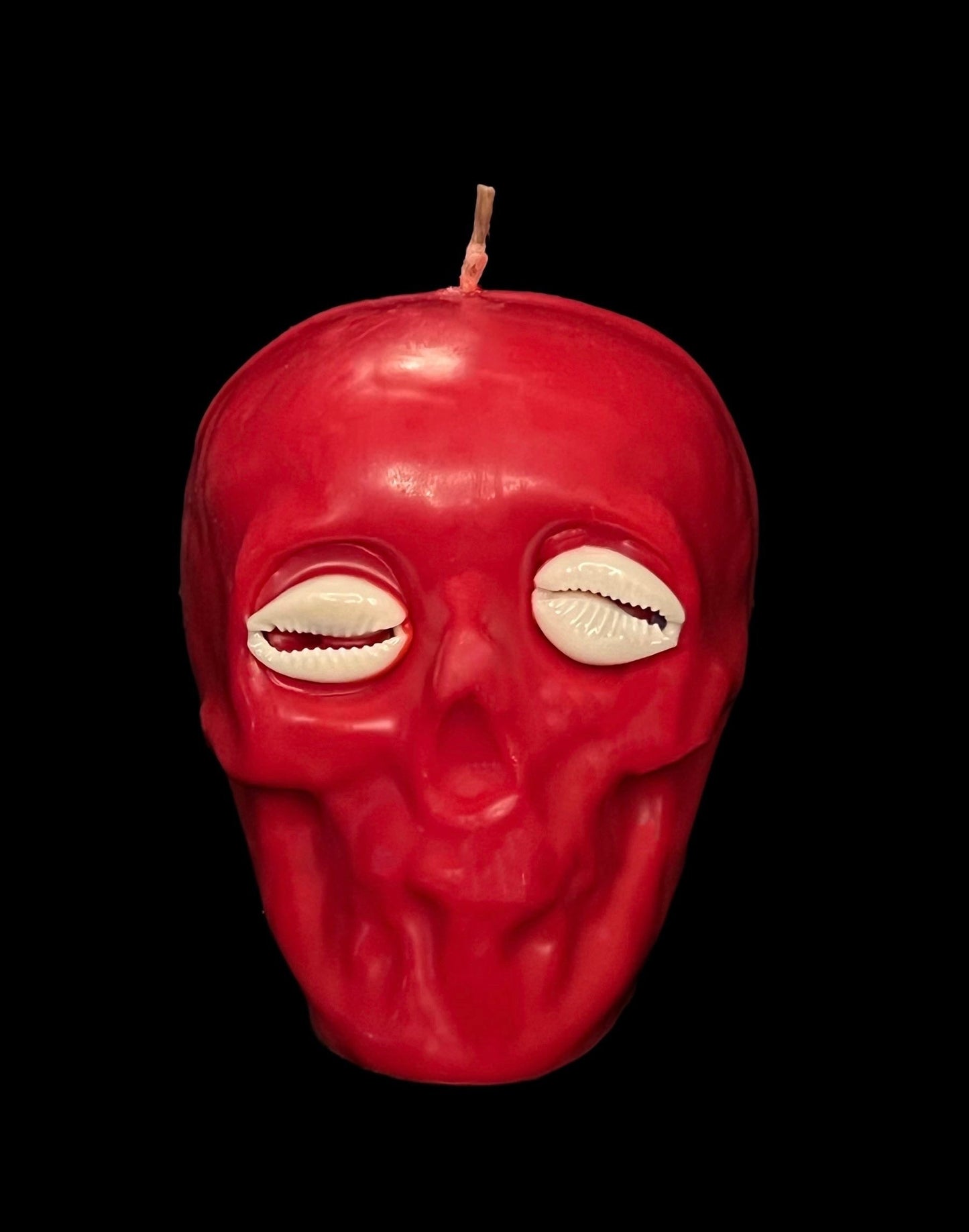 Skull Candle with Cowrie Eyes