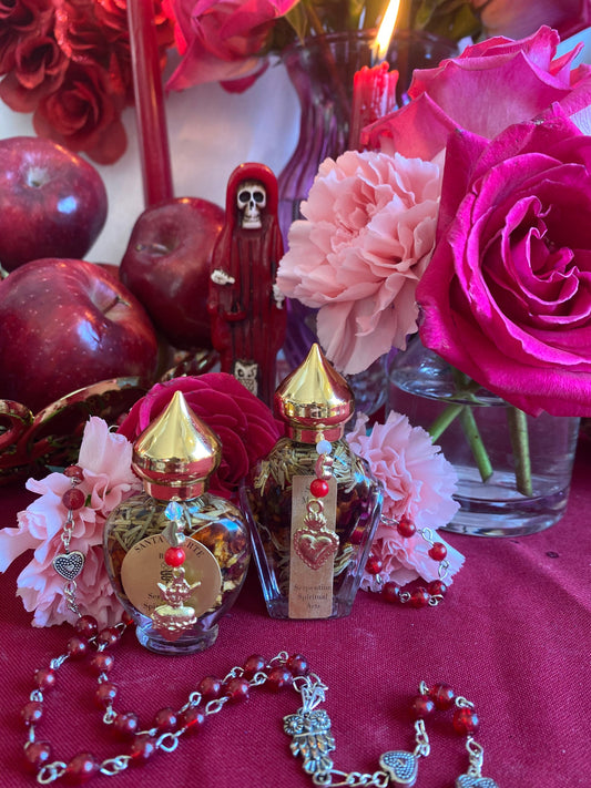 Santa Muerte Roja Oil + Love + Money + Justice + Domination