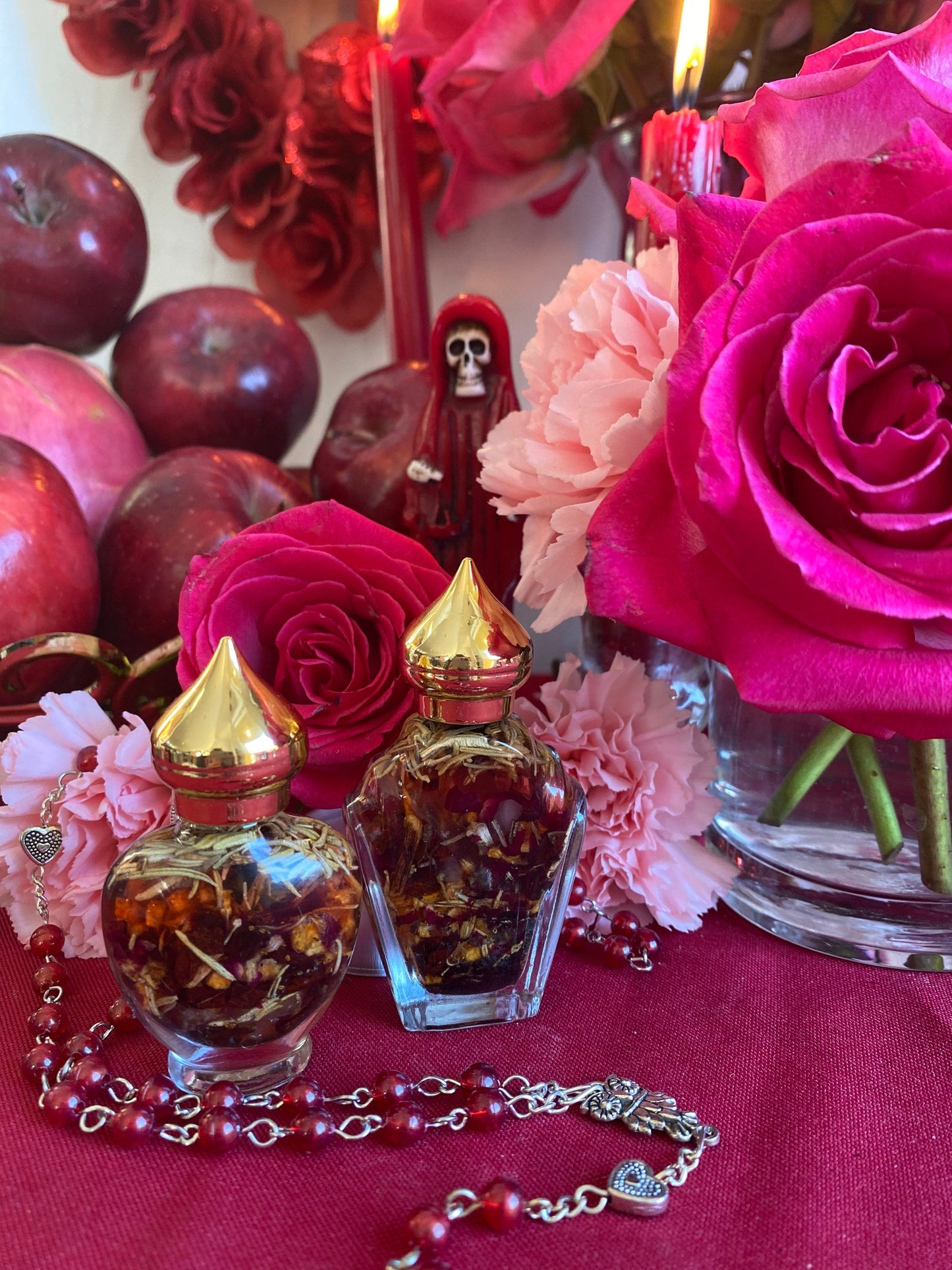 Santa Muerte Roja Oil + Love + Money + Justice + Domination