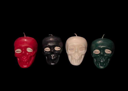 Skull Candle with Cowrie Eyes